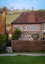 Cobstone Windmill and flint built cottage in Turville Village, Buckingham, England.