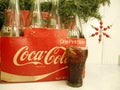 Coca cola bottles, vintage, and a handcrafted coca cola ornament