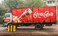 Coca-Cola brand drinks delivery truck on the city street. Bardhaman West Bengal India South Asia Pacific March 10, 2023