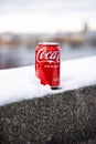 Coca cola can left in the city on the snow. Royalty Free Stock Photo