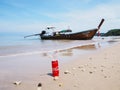 Coca-Cola can soft drink on sand at summer beach background Royalty Free Stock Photo