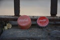 Coca Cola caps are resting with iron grills