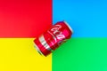 Coca - Cola carbonated soft drink on colorful background