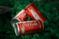Ayutthaya, Thailand-25June2020: Coca-Cola Classic in a glass bottle and can on dark toned cement Background. Coca Cola, Coke is th Royalty Free Stock Photo
