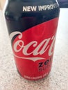 Coca cola coke zero red black can on white counter