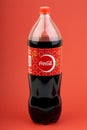 Coca Cola drink over a red background Royalty Free Stock Photo