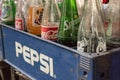 Coca cola, fanta and sprite bottles in pepsi box - vintage styl
