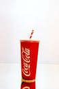 Coca Cola paper cup. Illustrative editorial photo in studio in Bucharest, Romania, 2021