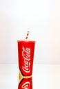 Coca Cola paper cup. Illustrative editorial photo in studio in Bucharest, Romania, 2021