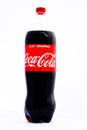 Coca-Cola plastic bottle Isolated on white background. Illustrative editorial photo shot in Bucharest, Romania, 2021 Royalty Free Stock Photo