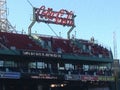 Coca cola sign hanging over grandstand seats at Fenway Park Royalty Free Stock Photo