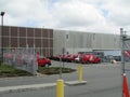 Coca-cola vehicles on parking lot. Royalty Free Stock Photo