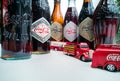 Coca Cola Vintage vehicles and old bottles