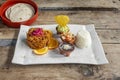 Cochinita pibil stew with corn tortillas to make tacos with pico de gallo, white rice, guacamole with tortilla chips Royalty Free Stock Photo