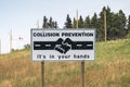 A route sign that has the text: Collision prevention it\'s in your hands