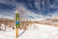 E-bike and pedal assist friendly sign on a hiking trail at Glenbow Ranch Provincial Park.