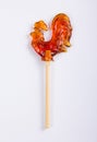 on a stick on a white background. Russian candies.