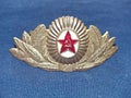 Cockade with the emblem to the cap for the dress uniform of officers of the Soviet Army of the Armed Forces USSR, 1969-1991 years. Royalty Free Stock Photo