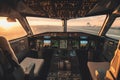 The cockpit of an airliner at sunset is a serene and tranquil sight, with the orange-red hues of the sun setting over Royalty Free Stock Photo