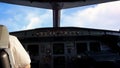 In cockpit, airplane flying over the clouds. View from the cockpit in the sky during the flight Royalty Free Stock Photo