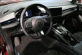 Cockpit and front seats interior of modern battery electric compact family wagon car MG5 EV