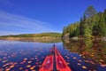 Fall color from cockpit of kayak Royalty Free Stock Photo
