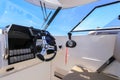 Cockpit motor boat with steering wheel and throttle control Royalty Free Stock Photo