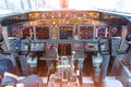 Cockpit in the plane, view of the control panel and steering wheels Royalty Free Stock Photo