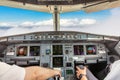 cockpit view of a commercial jet airliner with pilot in takeoff phase of flight Royalty Free Stock Photo