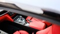 Cockpit view of an expensive German sports coupe showing the red leather interior. Royalty Free Stock Photo