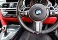 Cockpit view of an expensive German sports coupe showing the red leather interior. Royalty Free Stock Photo