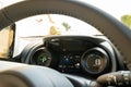 Cockpit view of a new, Japanese hybrid hatchback car. Royalty Free Stock Photo