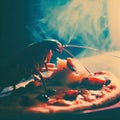A cockroach sits on a hot pizza