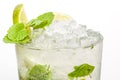 Cocktail - alcoholic mojito: syrup  lime  mint  Cuban rum  ice. Alcoholic cocktail in a glass on a white background. Isolated. Royalty Free Stock Photo