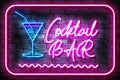 Cocktail Bar Neon Sign on a Dark Brick Wall Royalty Free Stock Photo