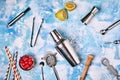 Cocktail Bar utensils scattered on blue background Royalty Free Stock Photo