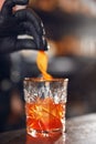 Cocktail. Bartender Preparing Cocktail In Bar