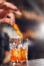 Cocktail. Bartender Preparing Cocktail In Bar