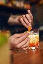 Cocktail. Bartender Preparing Cocktail In Bar