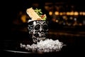 Cocktail in the black skull cup in mexican style