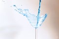 Cocktail with blue liquid in glass. Royalty Free Stock Photo