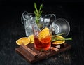 Cocktail Bulvardye. Whiskey and Orange Liquor. Alcoholic cocktail in a glass. On a wooden background. Royalty Free Stock Photo