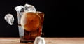 Cocktail with cola and limes slices isolated on black Royalty Free Stock Photo