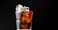 Cocktail with cola and limes slices isolated on black Royalty Free Stock Photo