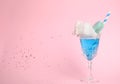 Cocktail with cotton candy in glass on pink background Royalty Free Stock Photo