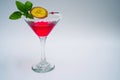 Cocktail drink pink with fruit on the rocks isolated at white Royalty Free Stock Photo