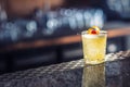 Cocktail drink whiskey sour at barcounter in night club or restaurant Royalty Free Stock Photo