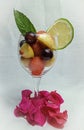 Cocktail of fresh season fruit with white background