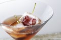 Cocktail with frozen cherries Royalty Free Stock Photo