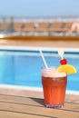 Cocktail with fruits in glass on ship deck floor Royalty Free Stock Photo